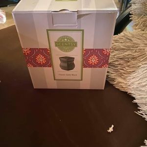 Black warmer and wax bar